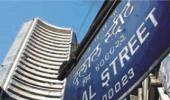 Markets end lower amid volatile trading session