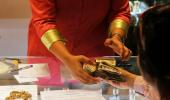 Banks in talks with temple trusts to push gold scheme