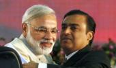 One year of Modi govt: Ambanis lose, Adani gains in stock market