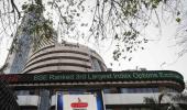 Markets end at record highs; Sensex gains 300 points