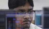 Sensex ends flat; banks soar, GAIL, RIL slip