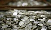 Rupee ends 14 paise stronger on rate cut hopes in early 2015