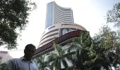 Sensex edges to record high, closes at 21,935