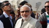 Modi pleases India Inc with tax talk