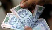 Rupee rises most in 7 weeks, ends at 59.69 on budget hopes