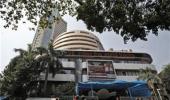 Sensex surges 138 pts to end at record closing peak