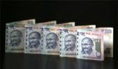 Rupee rises 15 paise to end at over 1-week high