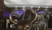 Sensex ends up 100 points, auto shares gain