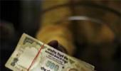 Rupee down 8 paise against dollar in early trade