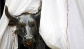 Sensex ends lower; auto shares rally, Maruti up 3%