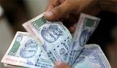 Rupee hits near 10-month peak before RBI's hand pulls it off