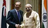 Modi and Abbott target free trade pact, sign 5 deals