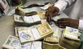 Rupee strengthens 18 paise to 61.76 vs dollar