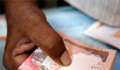 Rupee strengthens by 2 paise to 66.42