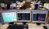 Markets in the red, Sensex still down over 200 points