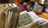 Rupee closes 22 paise lower against USD