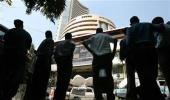 Sensex slips into red;  RIL Q4 nos eyed