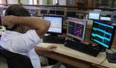 Sensex trims losses; bluechips climb higher