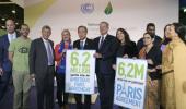 Ambition of Paris climate talks rises by half a degree