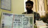 Rupee washes out initial losses vs dollar