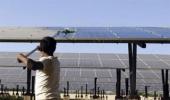 India builds solar plants atop canals to save land, water