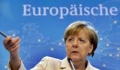 Greek deal done, Merkel's allies rush to sell it in Germany