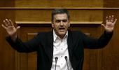 Greek PM keeps lid on party rebellion to pass bailout vote