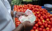 Rupee ends 2 paise down at 63.62 against USD