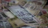 Rupee rebounds from one-week low, up 9 paise against dollar