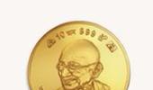 Modi launches gold schemes, coin with Ashok Chakra