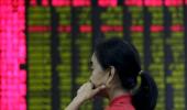 Asian shares sag as China stocks wobble after trading resumes