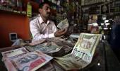 Rupee snaps 2-day gains, ends down 31 paise at 68.38