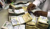 Rupee bounces back from 3-week lows, up 30 paise