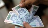 Rupee opens 25 paise lower against dollar at 67.28