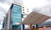 Cognizant widens bribery probe