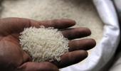 India defends its decision to ban rice, wheat exports