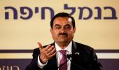 Adani Group to prepay $1.11 bn to release pledged shrs