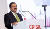 Adani Praises Manmohan, Modi...