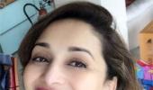 Want to know the secret of Madhuri Dixit's ageless beauty? Click here