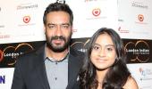 Ajay Devgn walks red carpet with daughter