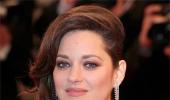 Marion Cotillard reacts to link up rumours with Brad Pitt