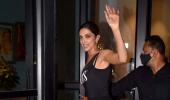 Who is Deepika Waving To?