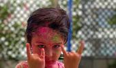 Taimur plays Holi!