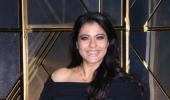 Why is Karan Johar KISSING Kajol?