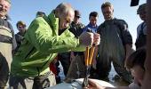 'Action man' Putin tags whale, dives deep