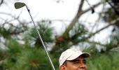 Fun and golf on Obama's holiday