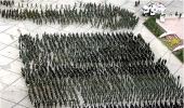China vows to execute rioters