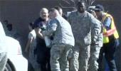 America reacts with shock, grief at army shootout