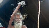 'Hands up' sadhu does it for world peace