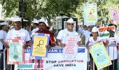 PIX: To back Anna, Indians demonstrate outside UN